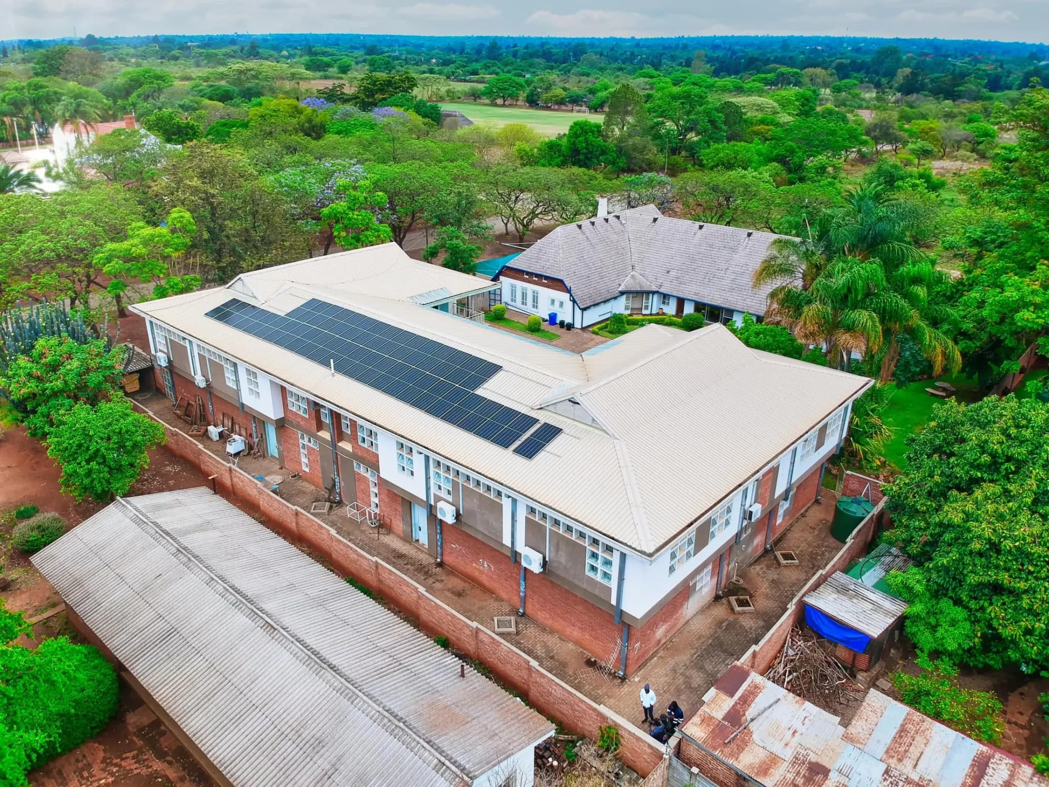 Aerial view of the finished solar array on the Palmer House roof at Girls College, Bulawayo